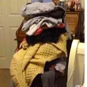 Pile of used sweaters and jackets/coats